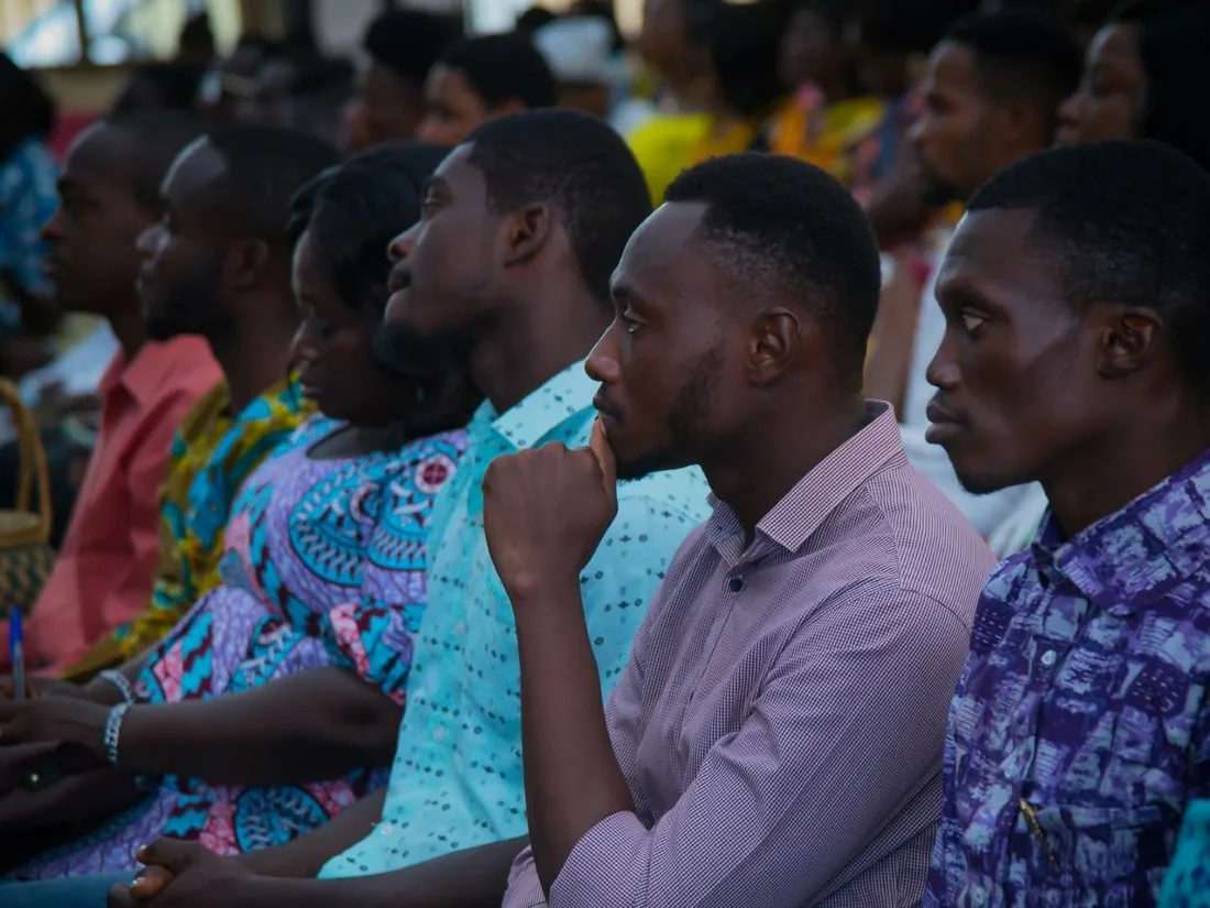 The congregation listening during a Sunday gathering